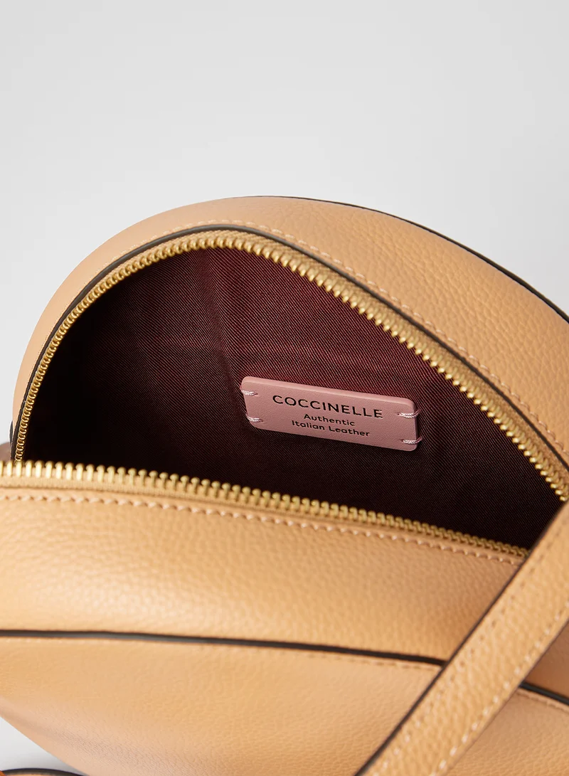 COCCINELLE Leather Circular Crossbody Bag Beige