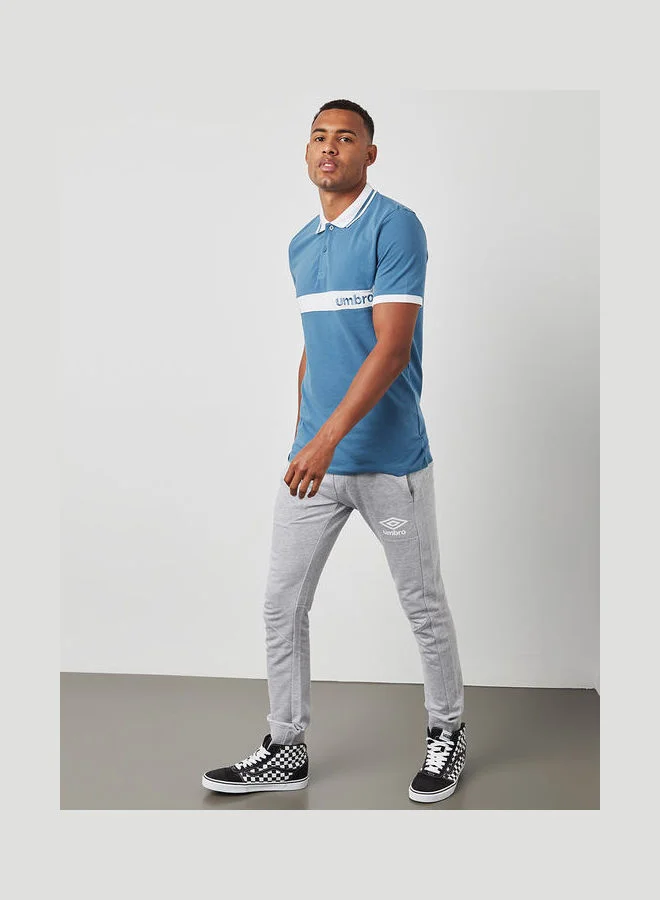 umbro Diamond Cut Button Detail Polo Blue