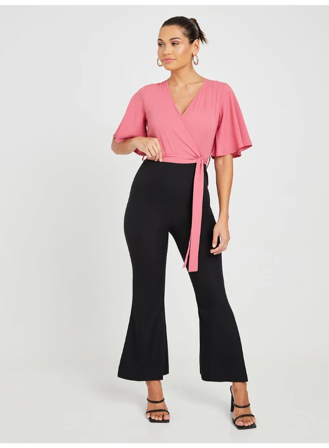 Closet By Styli Tie Belt Detail Colourblocked Flared Sleeve Jumpsuit Pink/Black