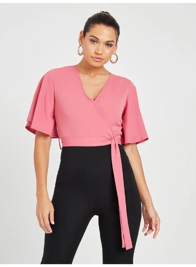 Closet By Styli Tie Belt Detail Colourblocked Flared Sleeve Jumpsuit Pink/Black