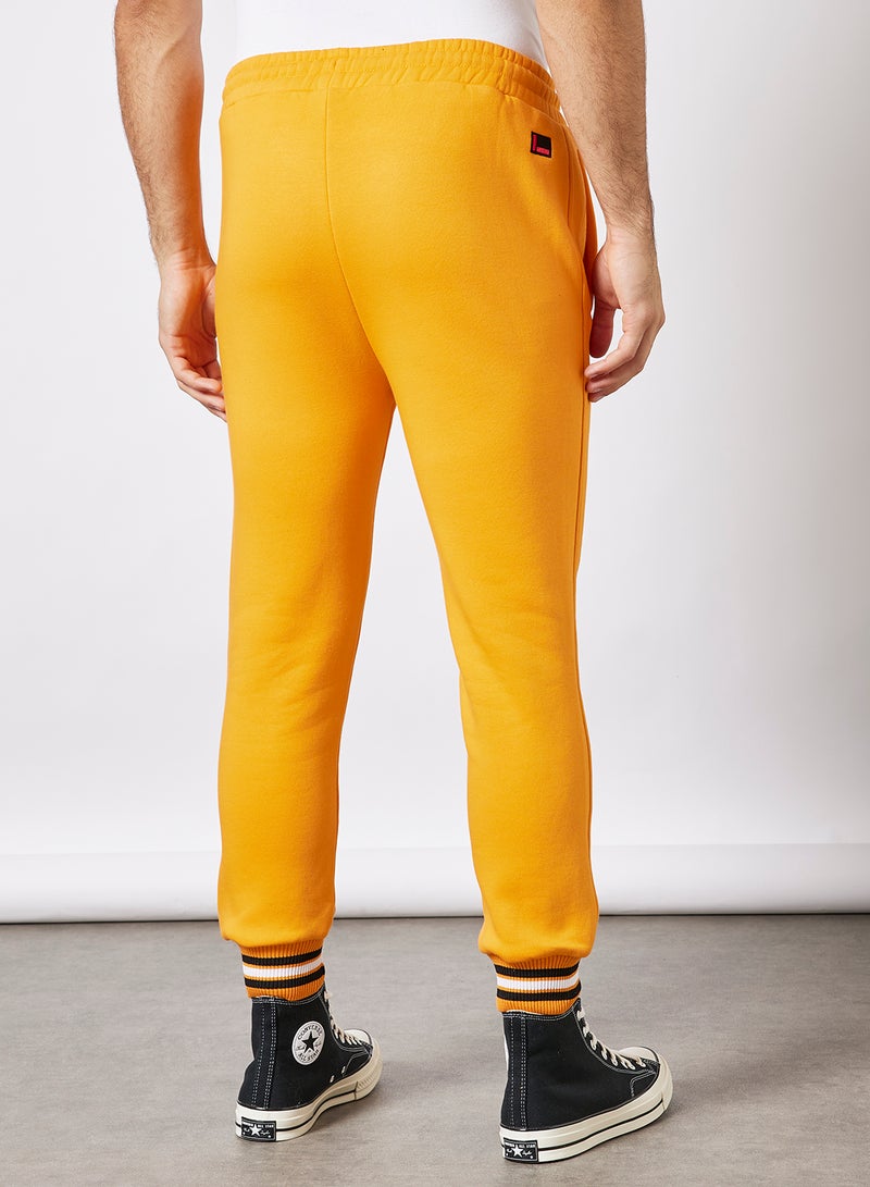 FUBU - Varsity SSL Joggers Orange - Image 1