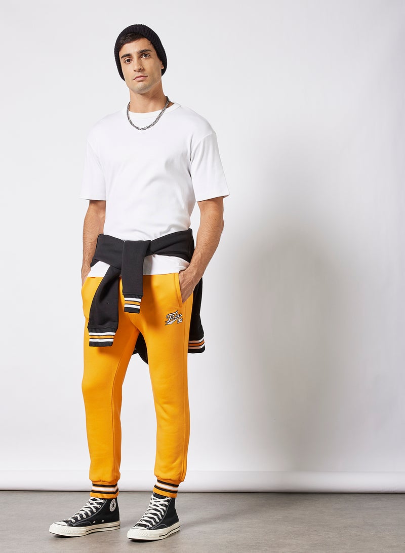 FUBU - Varsity SSL Joggers Orange - Image 1