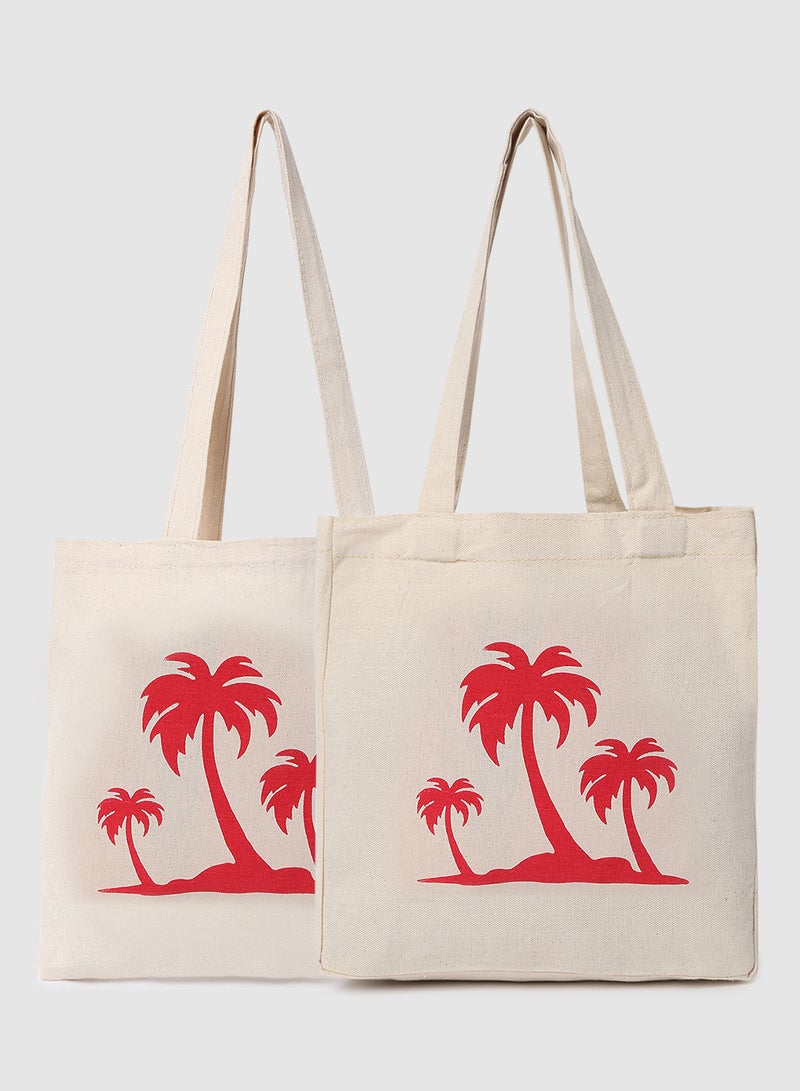 Amal - Pack Of 2 Palm Tree Print Canvas Shopping And Grocery Bags Color Shade May Vary Red - Image 1