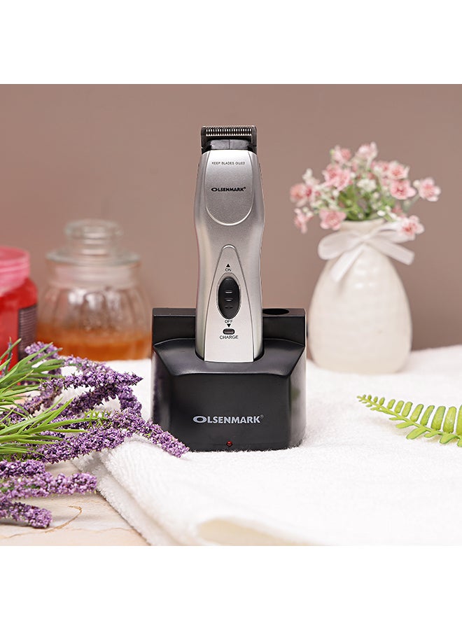 Olsenmark - Rechargeable Hair Trimmer  with Chromium Steel Blade - LED indicator light, Cordless - 5 Position Attachment with 3 Jawline Comb, Charging stand And Lubricant Oil Silver/Black - Image 1