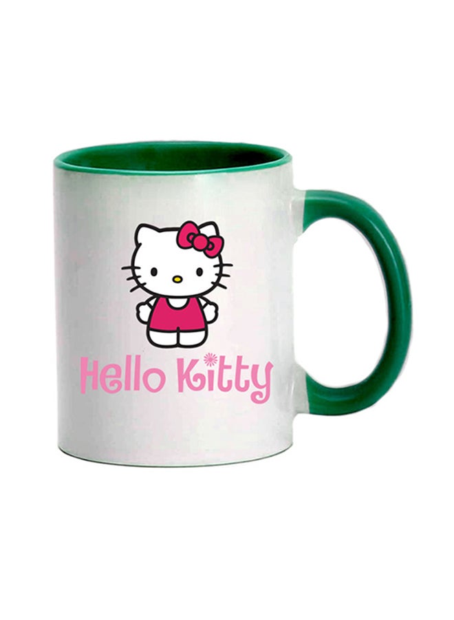 إم إي سي مج قهوة بطبعة نص "Hello Kitty" أخضر/ أبيض 350ملليلتر