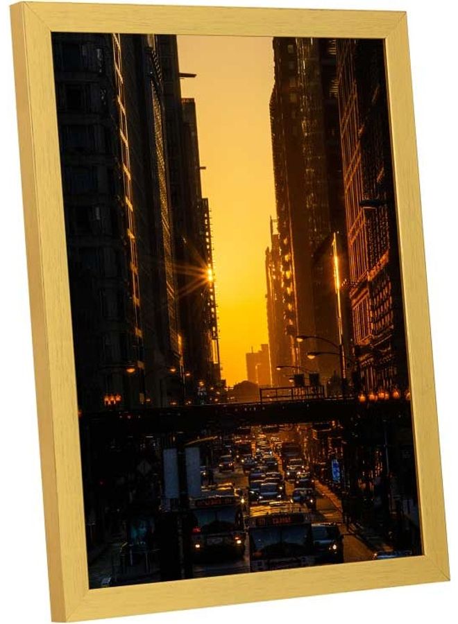 LOWHA Vehicles Passing On Road Between High-Rise Building Wall Art Frame Multicolour 33x43cm  - Image 2