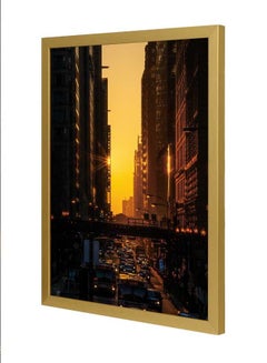 LOWHA Vehicles Passing On Road Between High-Rise Building Wall Art Frame Multicolour 33x43cm  - Image 1