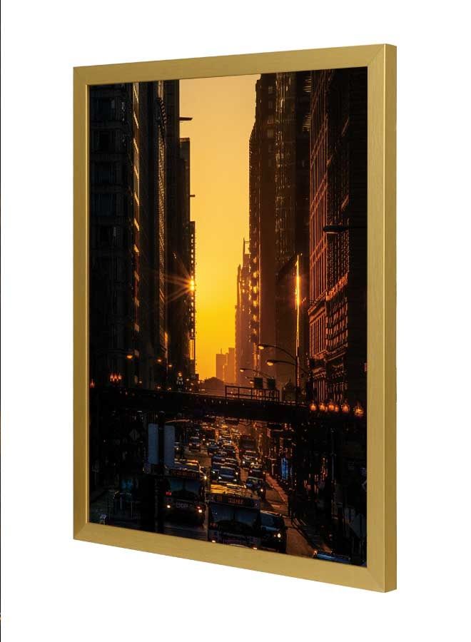 LOWHA Vehicles Passing On Road Between High-Rise Building Wall Art Frame Multicolour 33x43cm  - Image 1