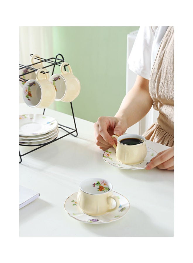 Shuer - 12-Piece Ergonomically Designed Fade-Proof Comfortable Grip Small Five Leaf Cup And Saucer Set With Stand Yellow/White 90ml - Image 1