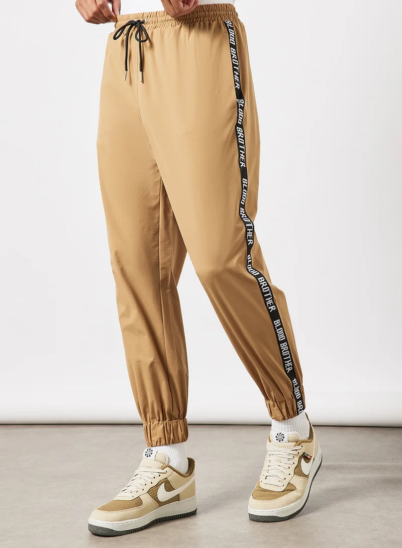 Blood Brother Logo Tape Joggers Taupe