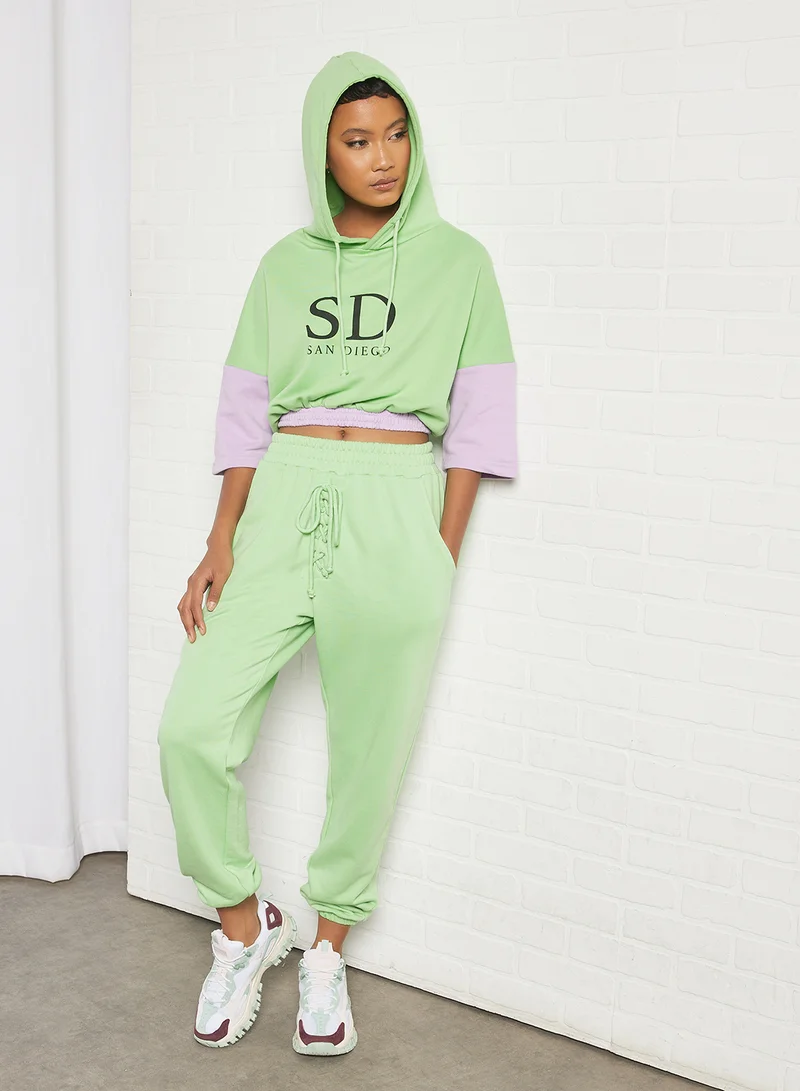 سيفي × جين أم Cropped Colorblock Slogan Hoodie Green/Purple