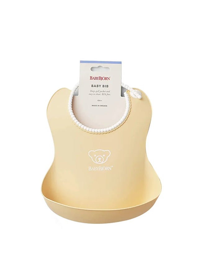 BABYBJORN - Baby Feeding Bib, Powder Yellow - Image 1