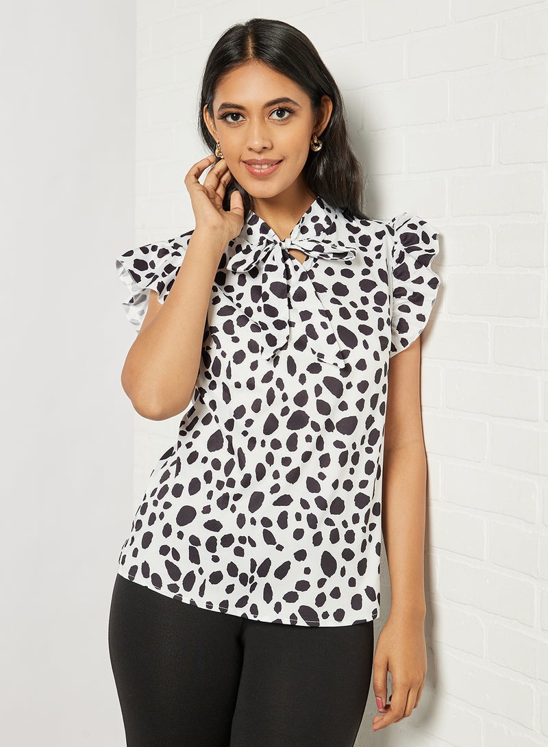 Aila Women's Casual Allover Print Design Cap Sleeve Top White/Black  - Image 1