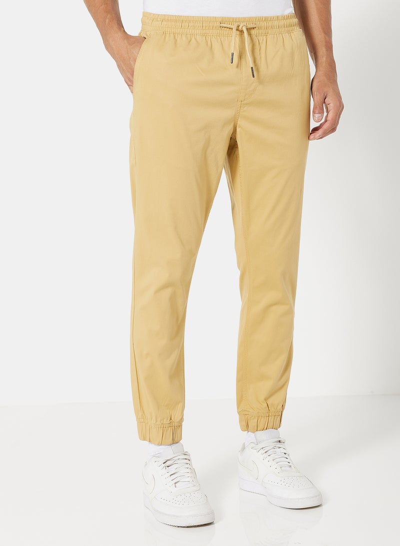 Noon East - Solid Pattern Premium Joggers Beige - Image 1