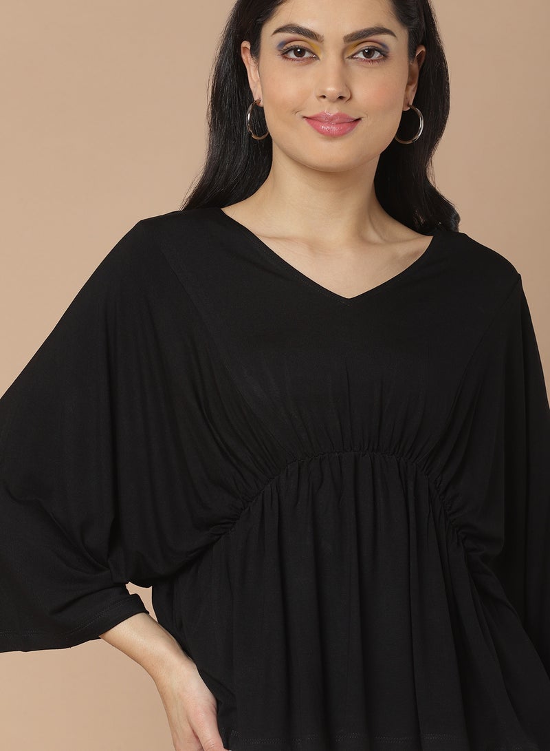 Aila - Solid Pattern Batwing Sleeve Top Black - Image 1