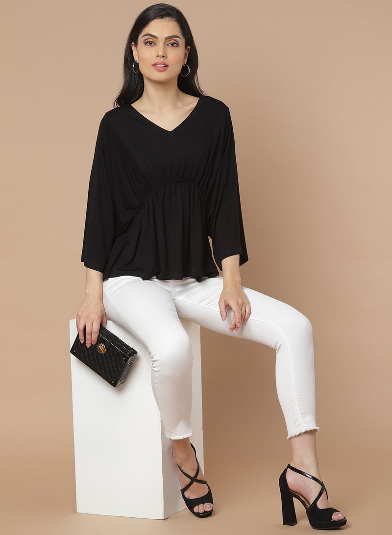 Aila - Solid Pattern Batwing Sleeve Top Black - Image 1