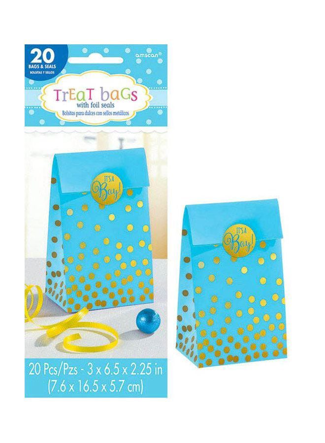 أمسكان أكياس ورقية مزخرفة باللون الأزرق مع ملصقات "إنه ولد" - Image 1