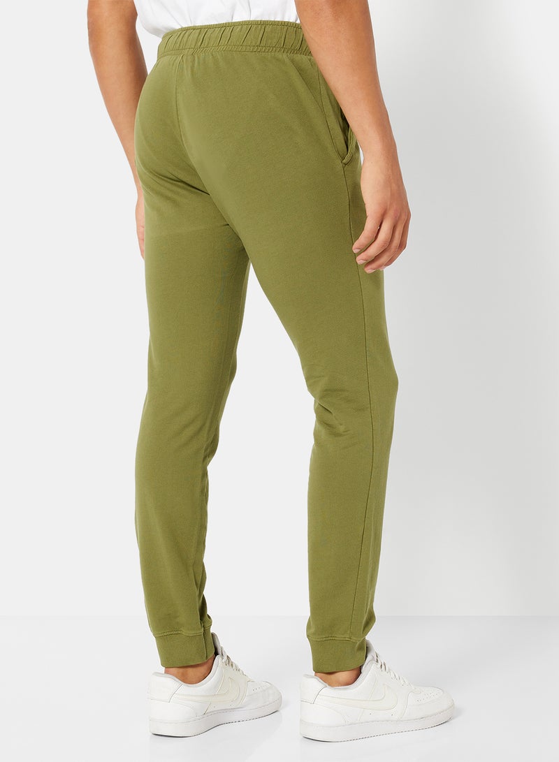 Sivvi x D'Atelier - Eco-Friendly Essential Slogan Sweatpants Olive - Image 1