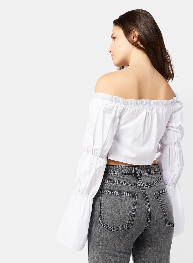 FEMME LUXE Ruched Long Sleeve Crop Top