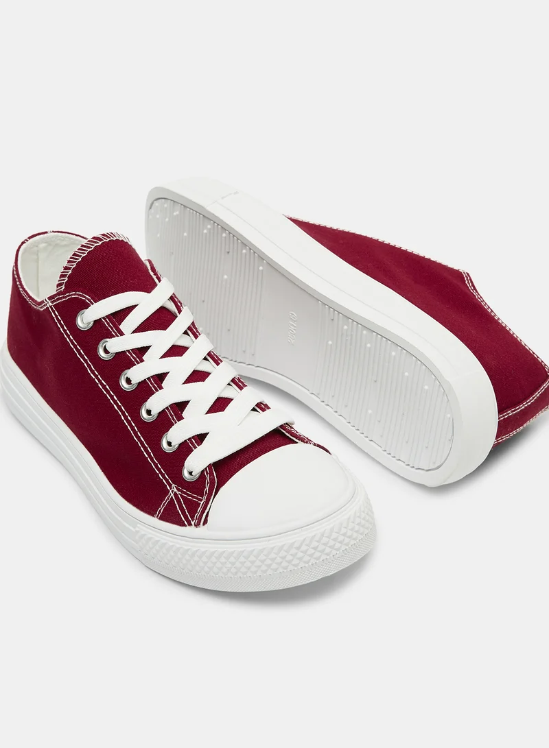 LABEL RAIL Canvas Low Top Sneakers Red