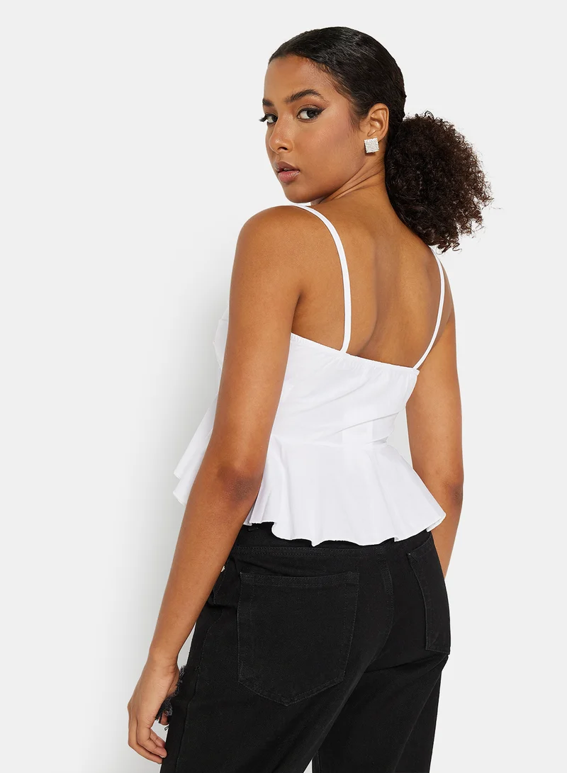 FEMME LUXE Bow Tie Peplum Top