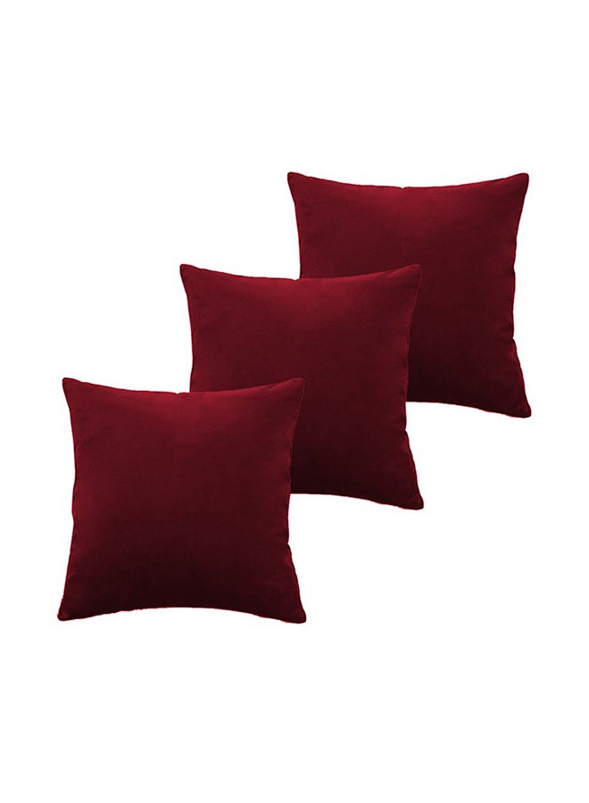 ريغال إن هاوس طقم وسائد ديكور عدد 3 مربعة الشكل مخملية ناعمة بتصميم سادة velvet برغندي 45 x 45سم  - Image 1