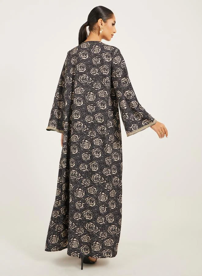 Styli front open abaya with all over foil print and lace detail at centre front with inner satin dress with lace trims