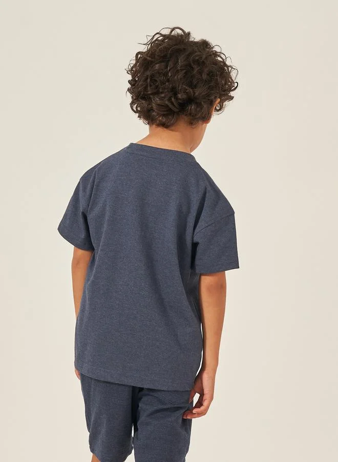 Styli Solid Oversized T-Shirt with Badge Detail