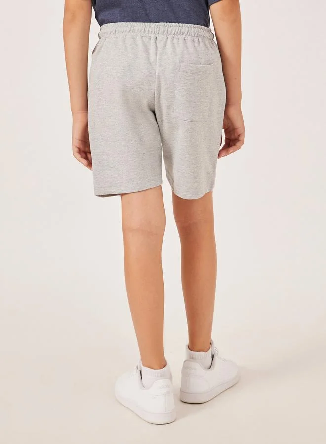 Styli Solid Drawstring Waist Shorts with Badge Detail