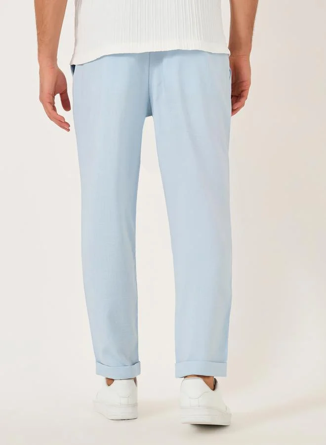 تايك تو بنطلون ستايلي بقصة مريحة وكسرات سادة