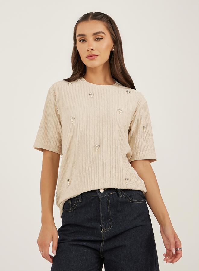 ستايلي بلوزة بياقة مستديرة مزينة بنقوش - Image 1