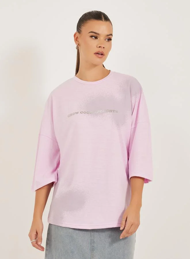 Styli Oversized Graphic Print T-Shirt with Dropped Shoulders