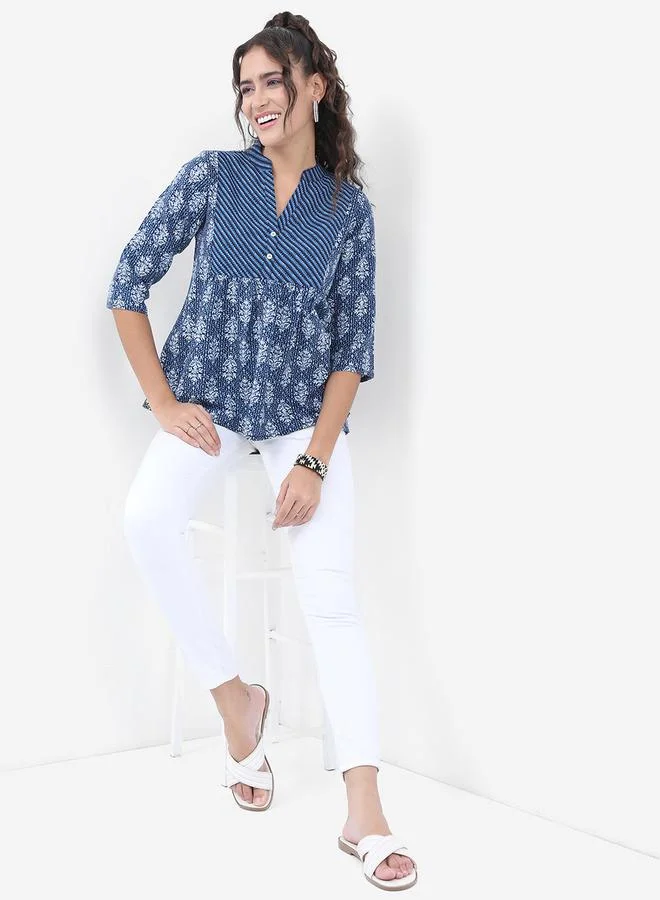 Vishudh Women Blue Floral Printed A-Line Top by Styli