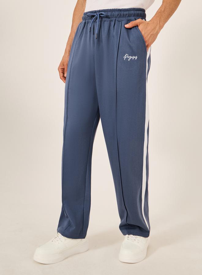Styli - Oversized Wide Tuck Fleece Joggers with Side Stripe and Print Detail - Image 1