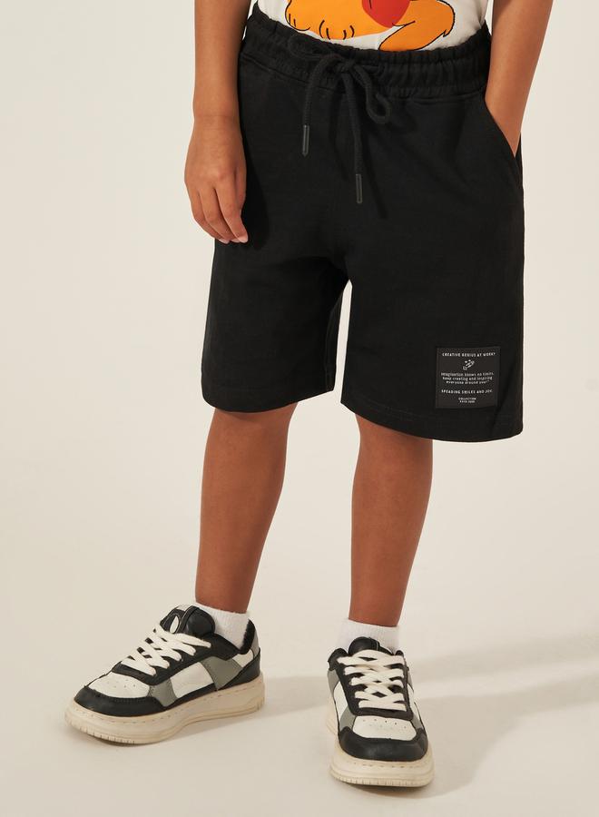 Styli Solid Drawstring Shorts with Badge Detail  - Image 1