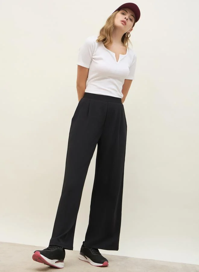 Styli Mid Rise Wide Leg Pants with Elasticated Waistband