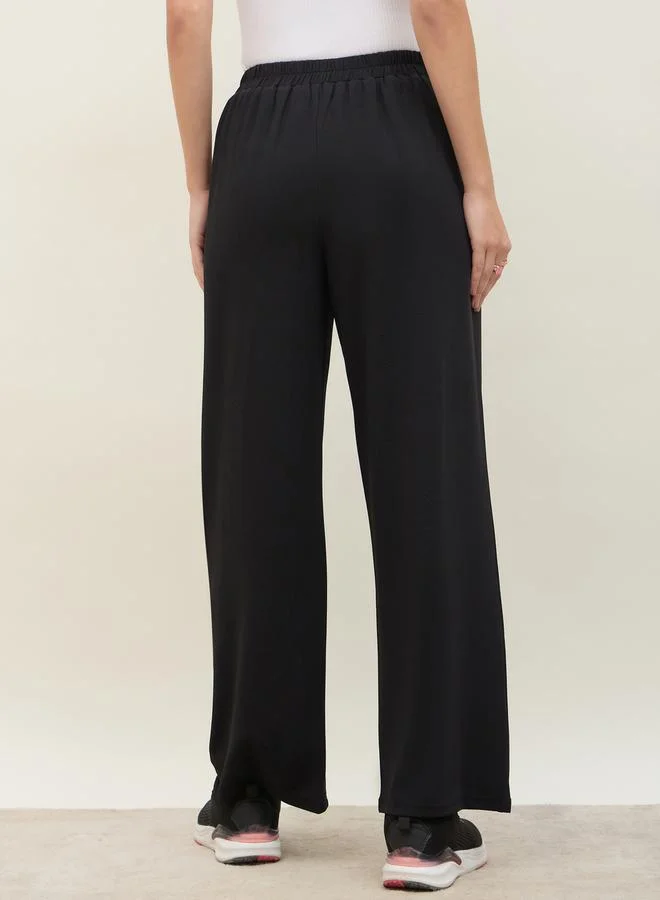 Styli Mid Rise Wide Leg Pants with Elasticated Waistband