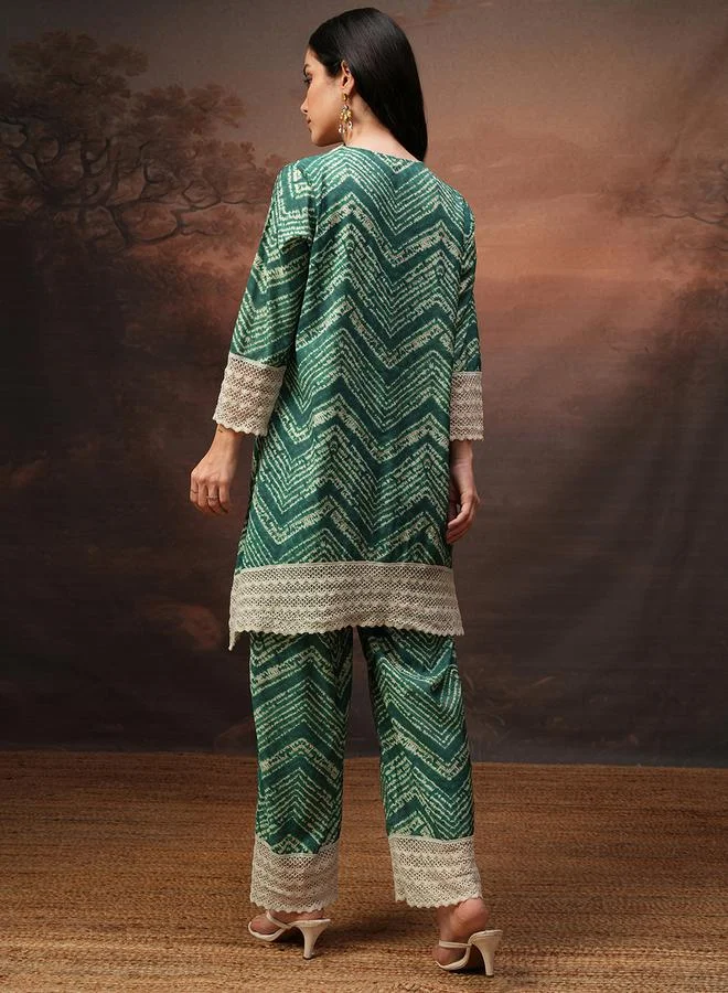 Vishudh Green Printed V Neck Tunic and Trousers Co-Ords by Styli