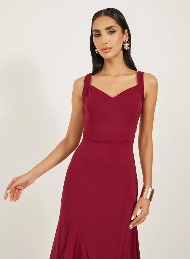 Take Two Solid Ruffled Asymmetric Hem A-Line Midi Dress by Styli