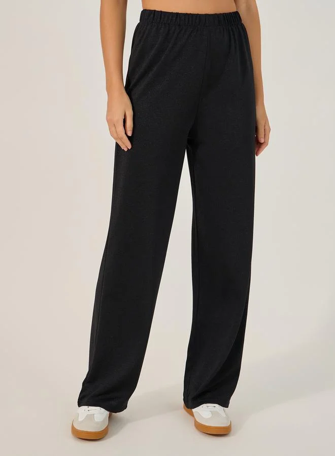 Styli Solid Knitted Asymmetrical Top and Straight Leg Pants Set