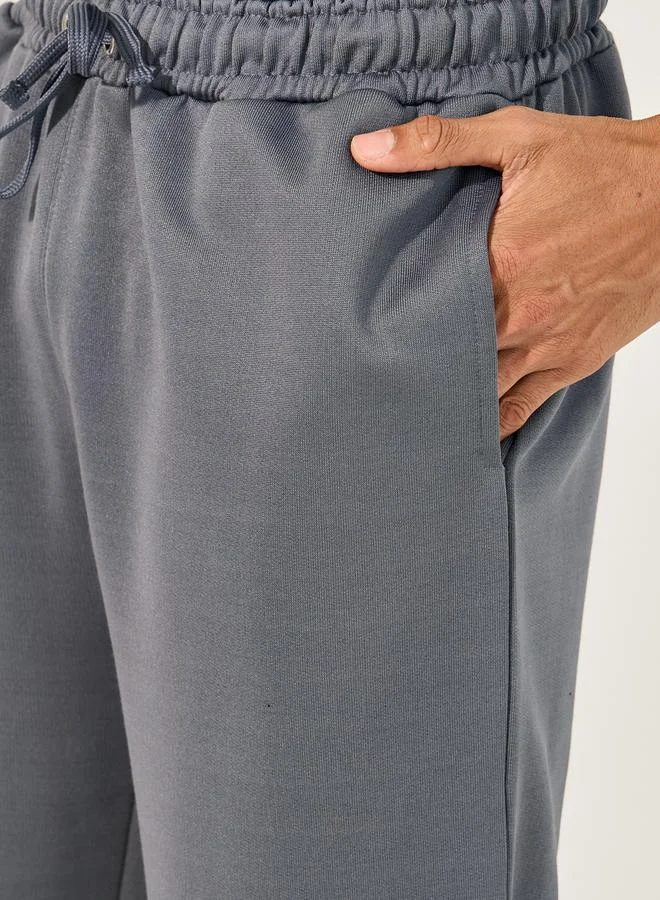 Styli Side Gusset Relaxed Track Pants with Zip Detail