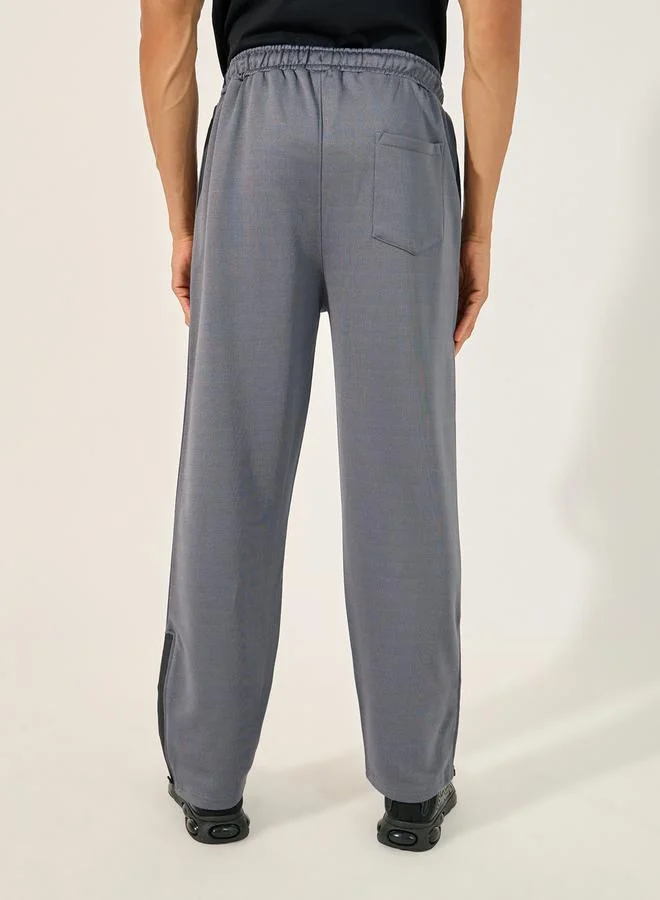 Styli Side Gusset Relaxed Track Pants with Zip Detail