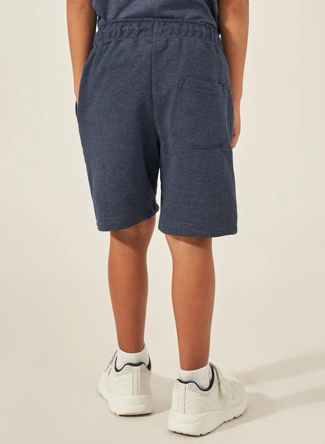 ستايلي Solid Drawstring Shorts with Badge Detail