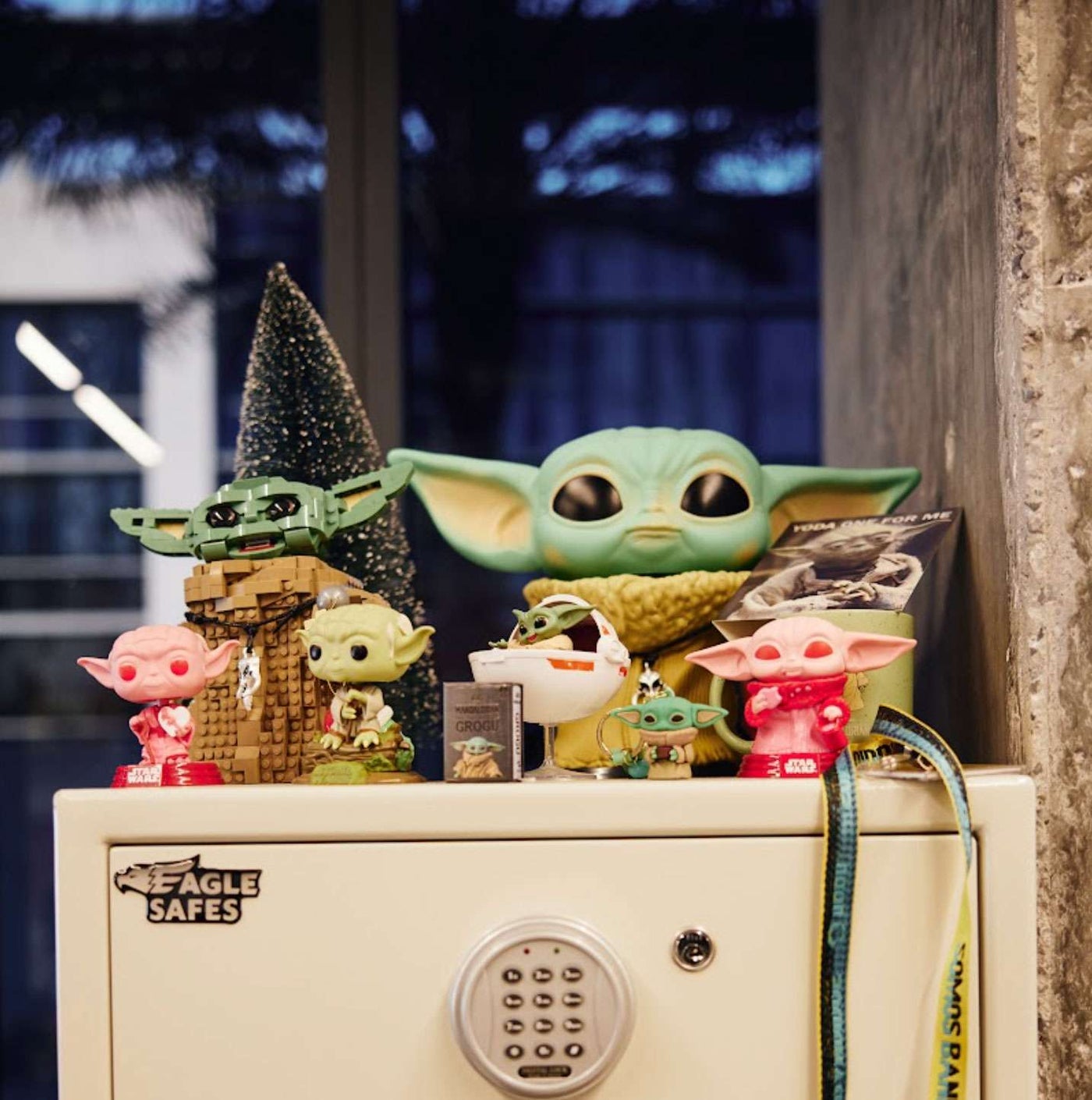 Star wars toys on top of a cabinet